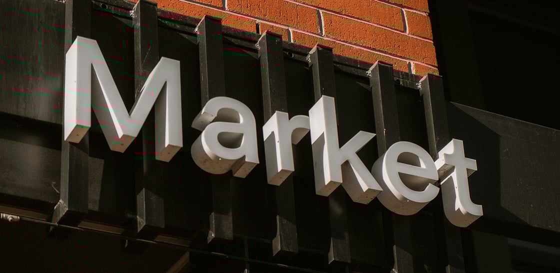 Sign showing the word Market - memento media - unsplash